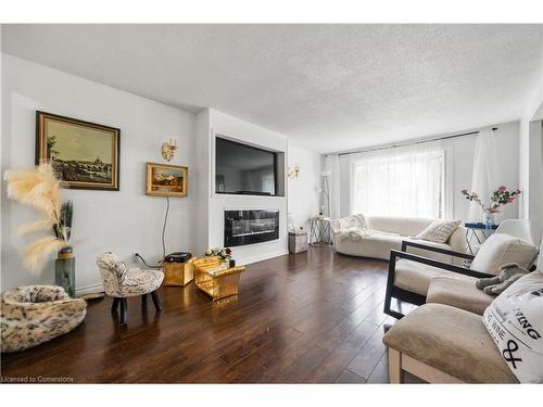 46 Calmcrest Drive, Kitchener, ON - Indoor Photo Showing Living Room With Fireplace