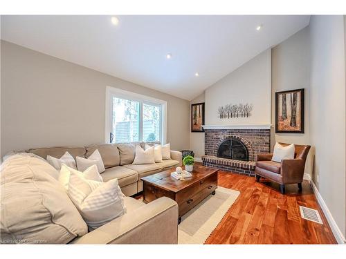 299 Craigleith Drive, Waterloo, ON - Indoor Photo Showing Living Room With Fireplace