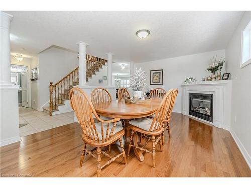 84 Mcfarlane Drive, Cambridge, ON - Indoor Photo Showing Dining Room With Fireplace