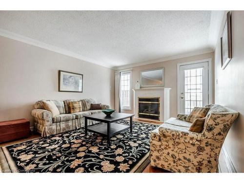 7-95 Beasley Crescent, Cambridge, ON - Indoor Photo Showing Living Room With Fireplace