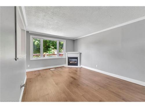 7 Hillside Drive, Kitchener, ON - Indoor Photo Showing Living Room With Fireplace