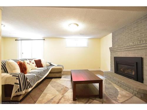 141 Fenwick Court, Kitchener, ON - Indoor Photo Showing Living Room With Fireplace