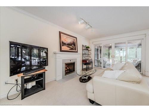 15 Trelawney Street, Kitchener, ON - Indoor Photo Showing Living Room With Fireplace