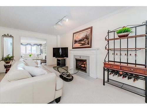 15 Trelawney Street, Kitchener, ON - Indoor Photo Showing Living Room With Fireplace