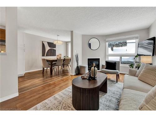 98 Bush Clover Crescent, Kitchener, ON - Indoor Photo Showing Living Room With Fireplace