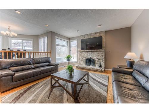 593 Guildwood Place, Waterloo, ON - Indoor Photo Showing Living Room With Fireplace