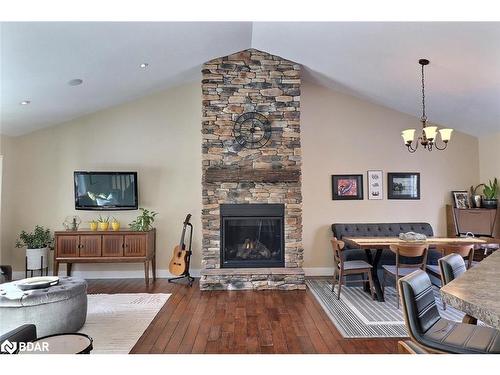 48 Tall Pines Drive, Tiny, ON - Indoor Photo Showing Living Room With Fireplace
