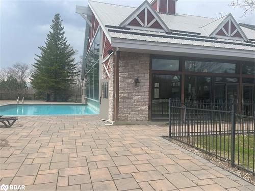 2430-31-90 Highland Drive, Oro-Medonte, ON - Outdoor With In Ground Pool