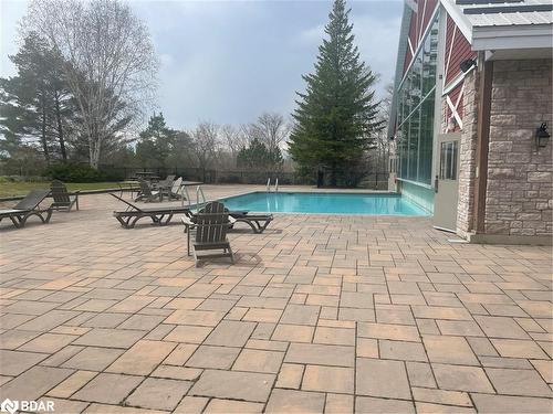 2430-31-90 Highland Drive, Oro-Medonte, ON - Outdoor With In Ground Pool