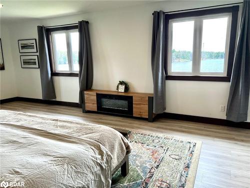 64 Mccord'S Road, Mckellar, ON - Indoor Photo Showing Bedroom