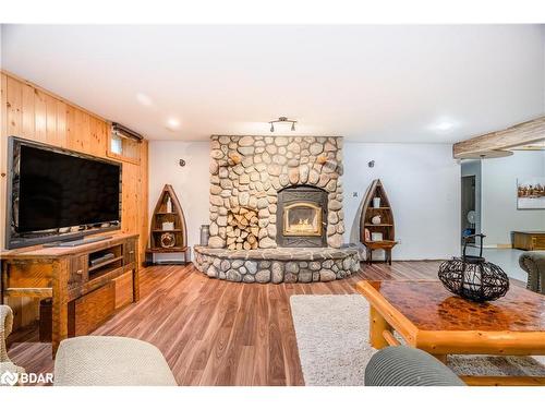 697 Lafontaine Road E, Tiny, ON - Indoor Photo Showing Living Room With Fireplace