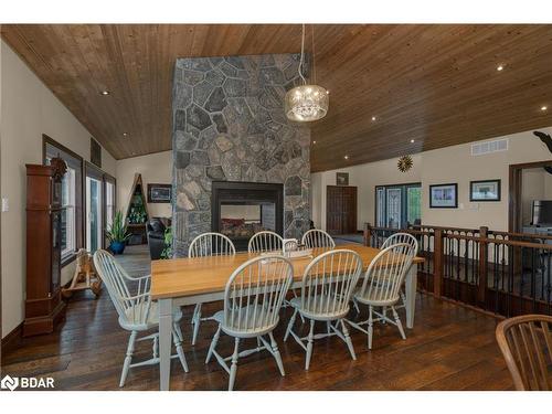 65 Big Sound Road, Mcdougall, ON - Indoor Photo Showing Dining Room With Fireplace