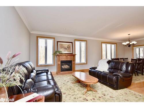 1524 Flos 8 Road E, Elmvale, ON - Indoor Photo Showing Living Room With Fireplace