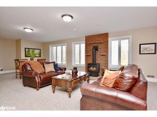 1524 Flos 8 Road E, Elmvale, ON - Indoor Photo Showing Living Room With Fireplace