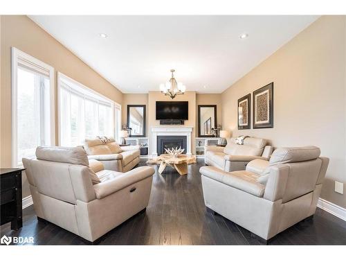 41 Heatherwood Drive, Springwater, ON - Indoor Photo Showing Living Room With Fireplace