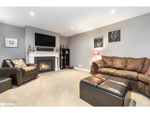 41 Heatherwood Drive, Springwater, ON - Indoor Photo Showing Living Room With Fireplace