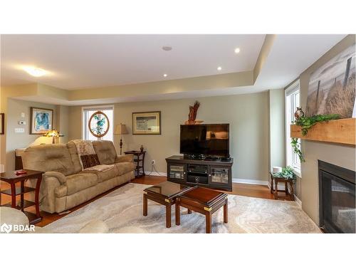 28 Masters Crescent, Port Severn, ON - Indoor Photo Showing Living Room With Fireplace