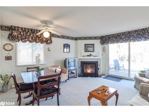 1-31 Laguna Parkway, Brechin, ON - Indoor Photo Showing Living Room With Fireplace