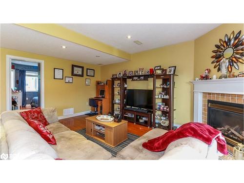 59 Nicklaus Drive, Barrie, ON - Indoor Photo Showing Living Room With Fireplace