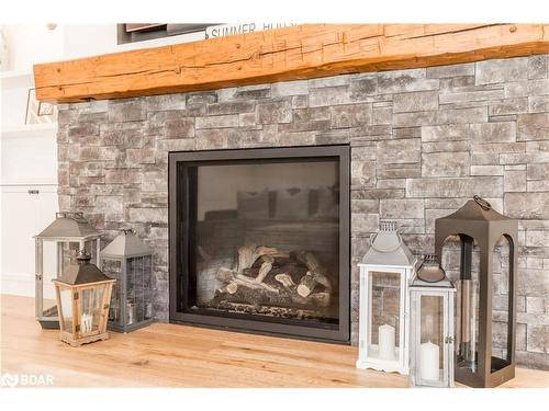 395 Eastdale Drive, Wasaga Beach, ON - Indoor Photo Showing Living Room With Fireplace
