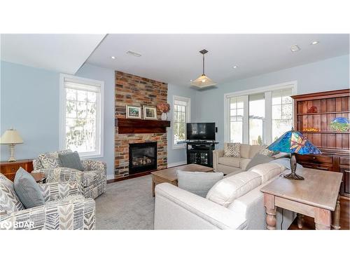 22 Marina Village Drive, Port Severn, ON - Indoor Photo Showing Living Room With Fireplace