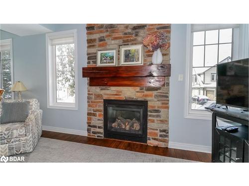 22 Marina Village Drive, Port Severn, ON - Indoor Photo Showing Living Room With Fireplace