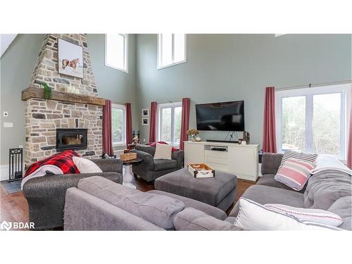 2388 Mcdonald Road, Elmvale, ON - Indoor Photo Showing Living Room With Fireplace