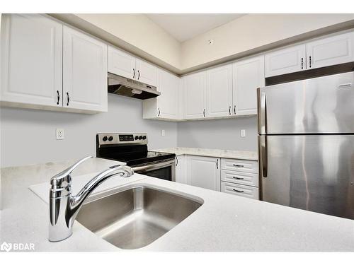 606-299 Cundles Road E, Barrie, ON - Indoor Photo Showing Kitchen With Double Sink