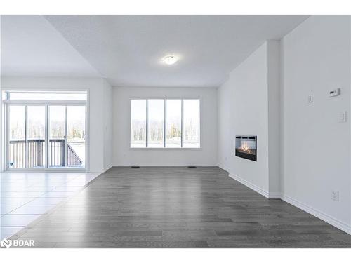 220 Ramblewood Drive, Wasaga Beach, ON - Indoor Photo Showing Living Room With Fireplace