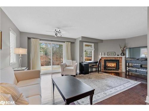 63 Shoreline Drive, Bracebridge, ON - Indoor Photo Showing Living Room With Fireplace