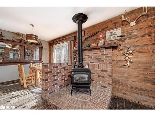 1309 Temple Avenue, Innisfil, ON - Indoor Photo Showing Other Room With Fireplace