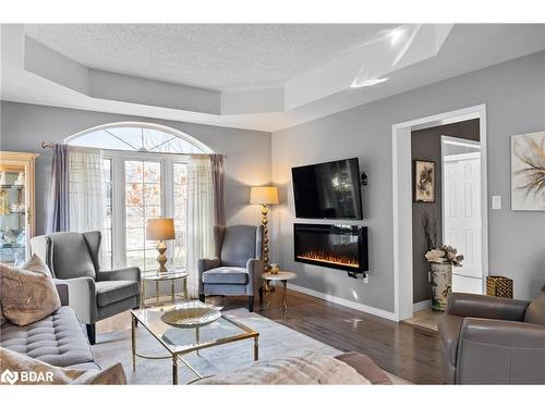8670 Crayton Court, Gowanstown, ON - Indoor Photo Showing Living Room With Fireplace
