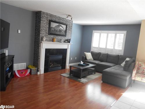 15 Rose Valley Way, Wasaga Beach, ON - Indoor Photo Showing Living Room With Fireplace