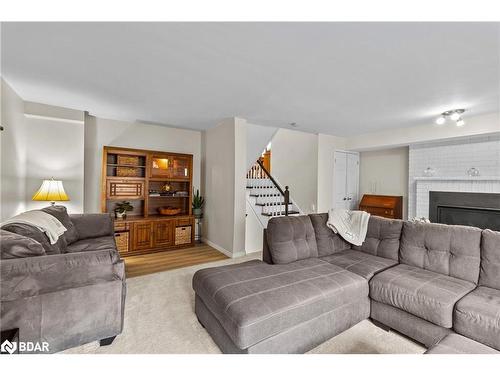 31-7 Briarwood Drive, Alliston, ON - Indoor Photo Showing Living Room With Fireplace