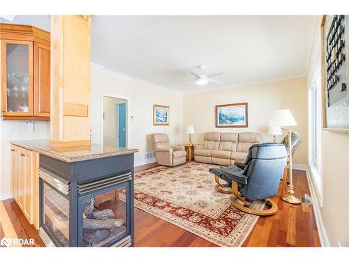 24 Finley Drive, Tiny, ON - Indoor Photo Showing Living Room With Fireplace