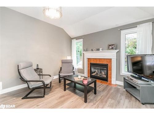 35 Reillys Run, Minesing, ON - Indoor Photo Showing Living Room With Fireplace