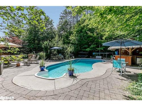 35 Reillys Run, Minesing, ON - Outdoor With In Ground Pool With Backyard