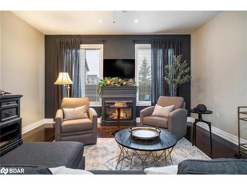 20 Prince William Way, Barrie, ON - Indoor Photo Showing Living Room With Fireplace