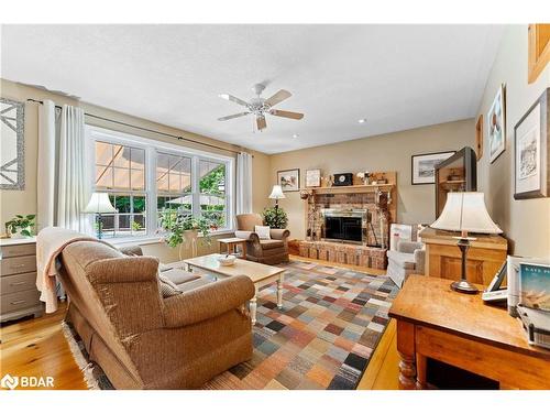 26 Paddy Dunn'S Circle, Springwater, ON - Indoor Photo Showing Living Room With Fireplace