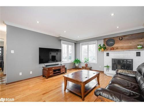 26 Roth Street, Angus, ON - Indoor Photo Showing Living Room With Fireplace