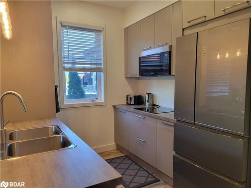 102-16 Beckwith Lane, The Blue Mountains, ON - Indoor Photo Showing Kitchen With Double Sink