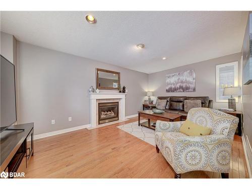 19 Allsop Crescent, Barrie, ON - Indoor Photo Showing Living Room With Fireplace