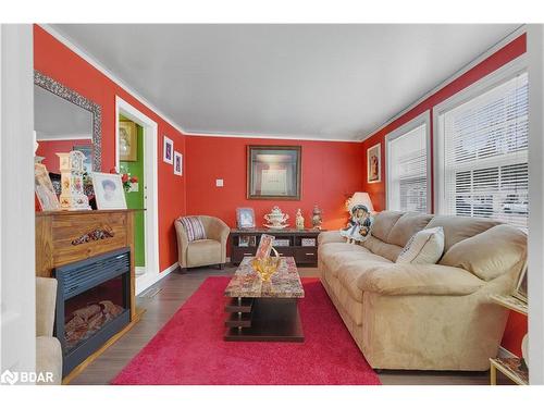 1 Malta Avenue, Wasaga Beach, ON - Indoor Photo Showing Living Room With Fireplace