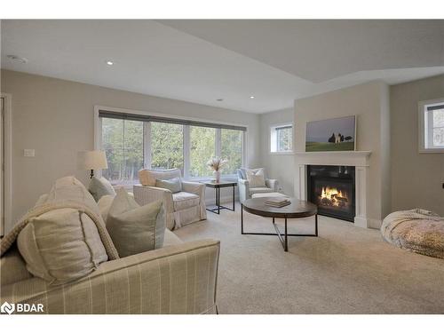 4 Cumberland Court, Oro-Medonte, ON - Indoor Photo Showing Living Room With Fireplace