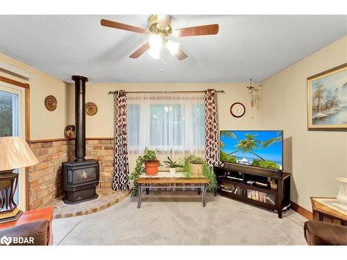 9 Riverside Crescent, Wasaga Beach, ON - Indoor Photo Showing Other Room With Fireplace