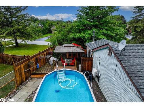 9 Riverside Crescent, Wasaga Beach, ON - Outdoor With Above Ground Pool