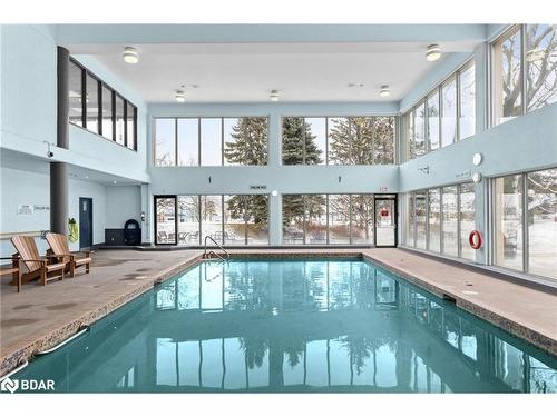 808-65 Ellen Street, Barrie, ON - Indoor Photo Showing Other Room With In Ground Pool