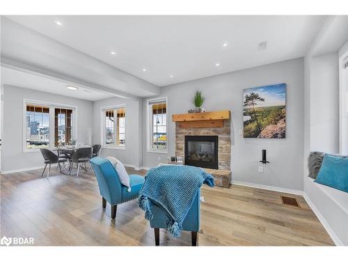 39 Country Trail, Port Severn, ON - Indoor Photo Showing Living Room With Fireplace