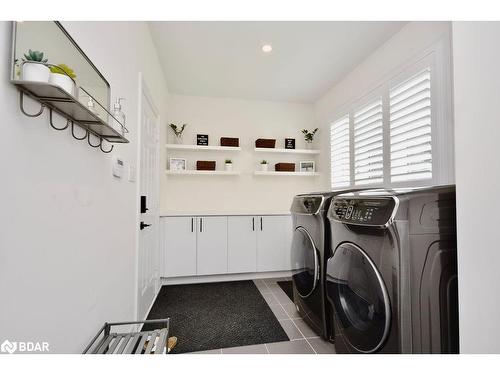 71 Redmond Crescent, Springwater, ON - Indoor Photo Showing Laundry Room