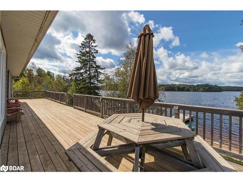 106 Johnston Road, Magnetawan, ON - Outdoor With Body Of Water With Deck Patio Veranda